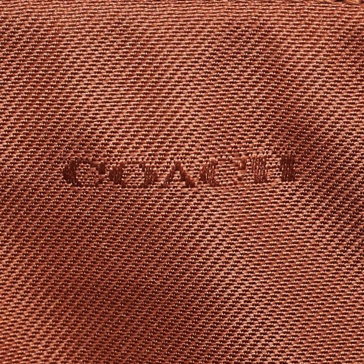 Pre Owned Coach Beige/Peach Signature Coated Canvas and Leather Zip Wristlet Pouch