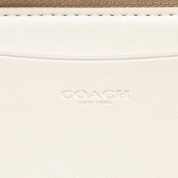 Pre Owned Coach Light Khaki Signature Coated Canvas Zip Around Wallet