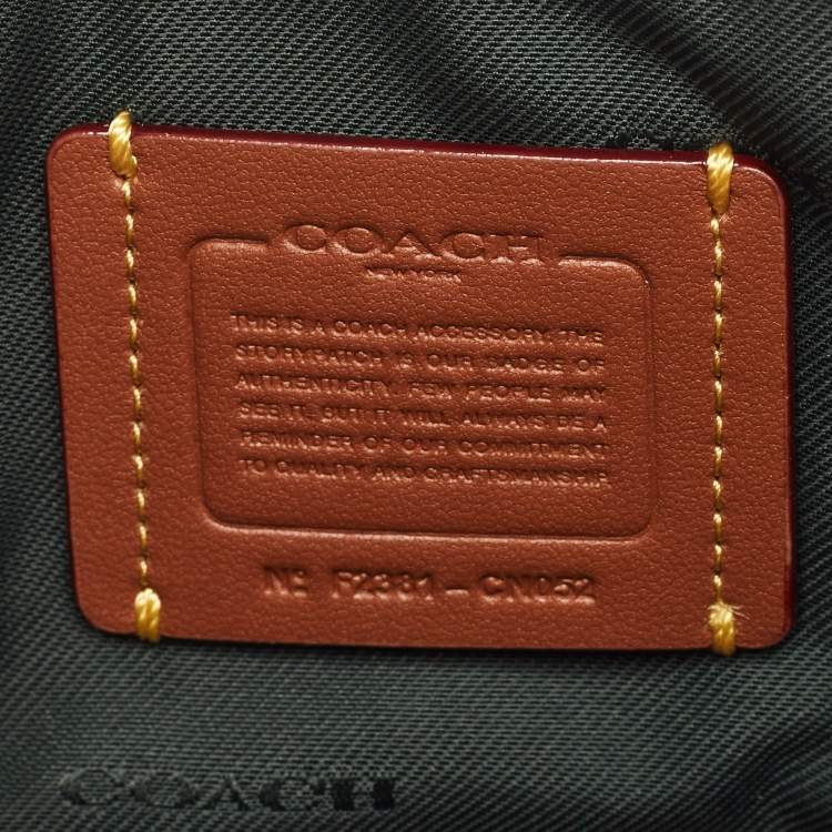 Pre Owned Coach Green Signature Embossed Leather Kira Double Zip Crossbody Bag