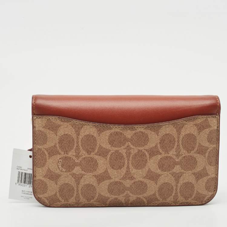Pre Owned Coach Beige/Brown Signature Coated Canvas and Leather Hayden Crossbody Bag