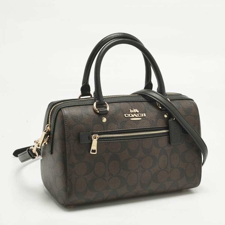 Pre Owned Coach Brown/Black Signature Coated Canvas and Leather Rowan Satchel