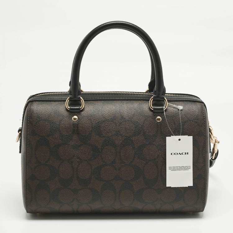 Pre Owned Coach Brown/Black Signature Coated Canvas and Leather Rowan Satchel