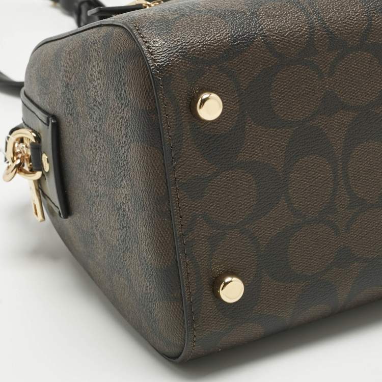 Pre Owned Coach Brown/Black Signature Coated Canvas and Leather Rowan Satchel