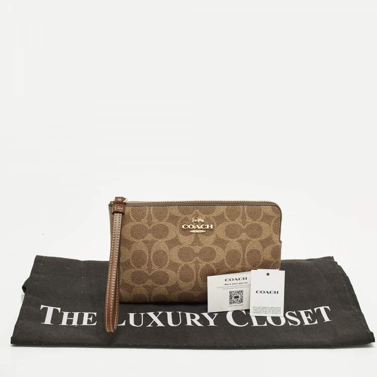 Pre Owned Coach Corner Zip Beige Signature Coated Canvas Wristlet Pouch