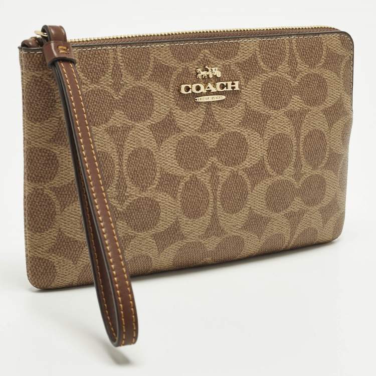 Pre Owned Coach Corner Zip Beige Signature Coated Canvas Wristlet Pouch