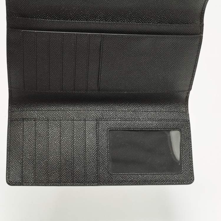 مملوكة مسبقًا محفظة كوتش ثلاثية الطي نحيفة جلد أسود