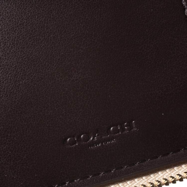 Pre Owned Coach Beige Signature Coated Canvas Strawberry Zip Around Wallet     