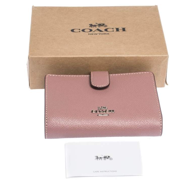 Pre Owned Coach Pink Textured Leather Compact Wallet