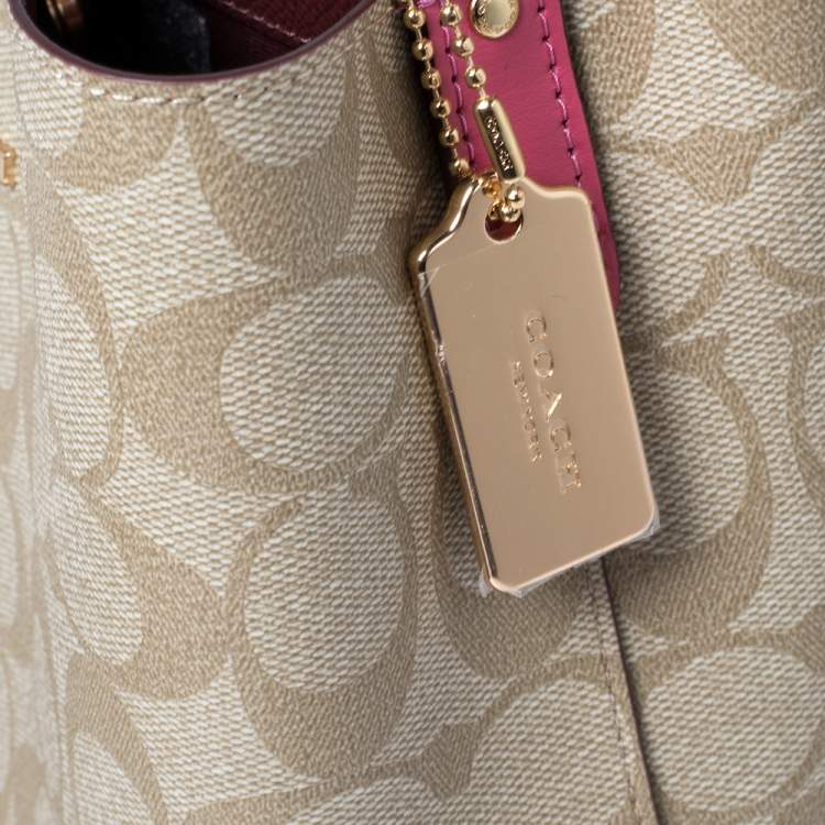 Pre Owned Coach Beige/Pink Signature Coated Canvas and Leather Small Town Bucket Bag