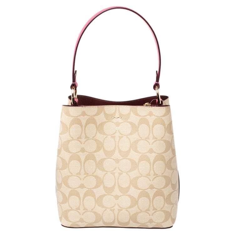 Pre Owned Coach Beige/Pink Signature Coated Canvas and Leather Small Town Bucket Bag