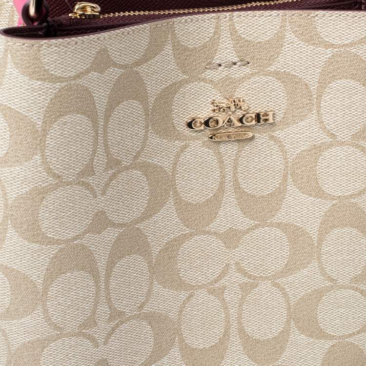 Pre Owned Coach Beige/Pink Signature Coated Canvas and Leather Small Town Bucket Bag