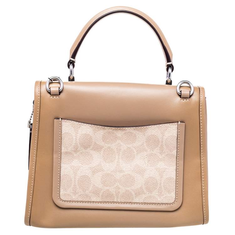 Pre Owned Coach Beige Signature Coated Canvas And Leather Parker Top Handle Bag