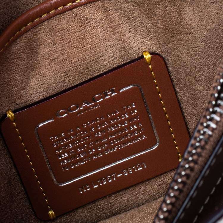Pre Owned Coach Beige Signature Coated Canvas And Leather Parker Top Handle Bag