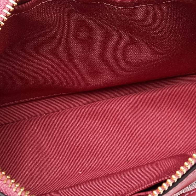 Pre Owned Coach Pink Pebbled Leather Wristlet