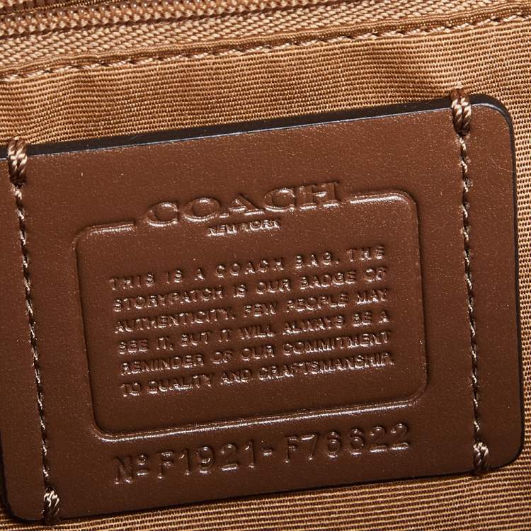 Pre Owned Coach White/Brown Signature Coated Canvas and Leather Jordyn Backpack