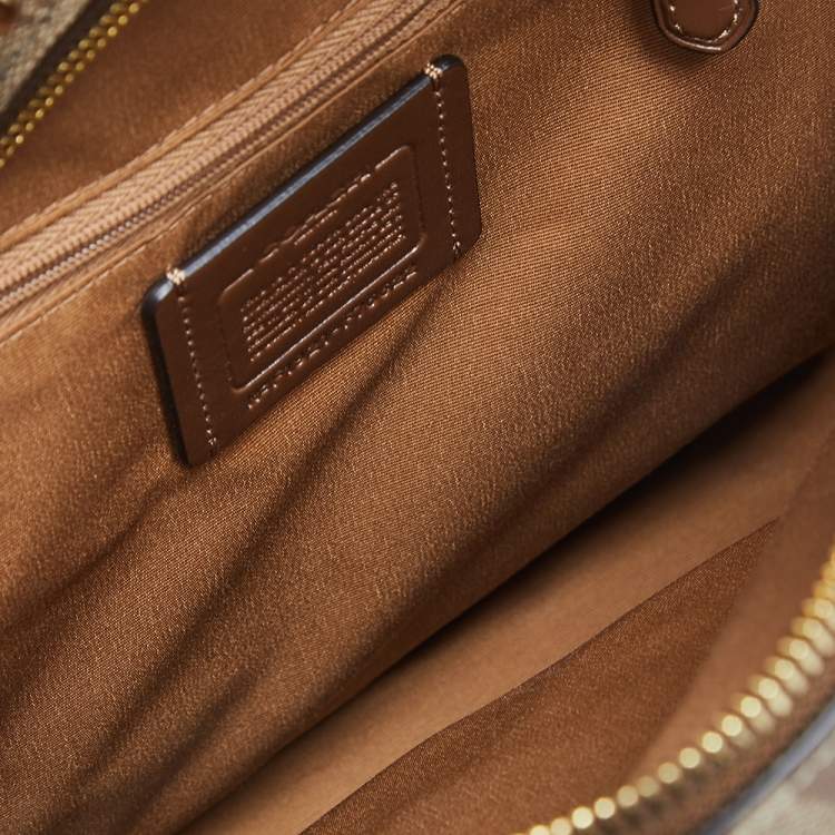 Pre Owned Coach White/Brown Signature Coated Canvas and Leather Jordyn Backpack