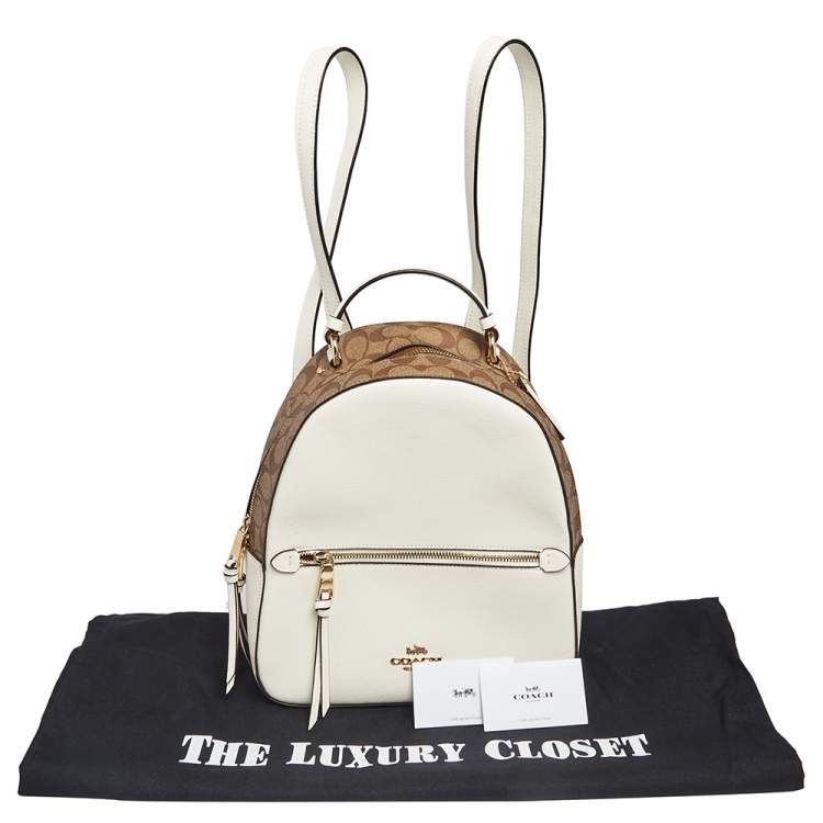 Pre Owned Coach White/Brown Signature Coated Canvas and Leather Jordyn Backpack