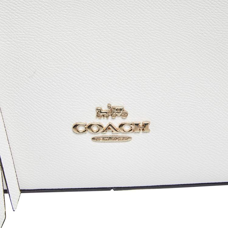 Pre Owned Coach White/Brown Signature Coated Canvas and Leather Jordyn Backpack