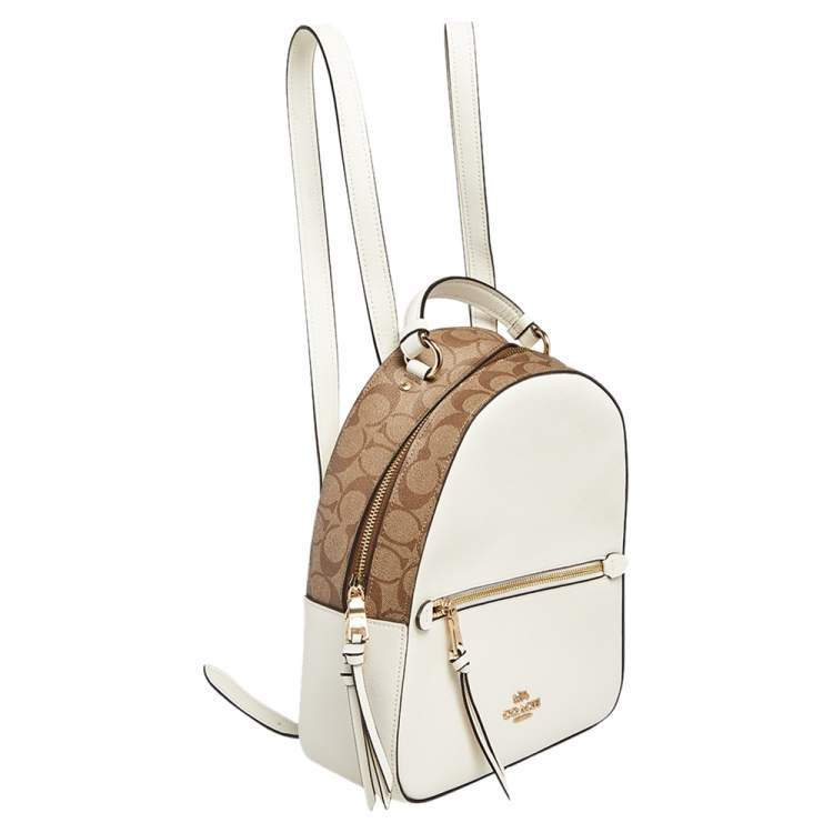 Pre Owned Coach White/Brown Signature Coated Canvas and Leather Jordyn Backpack