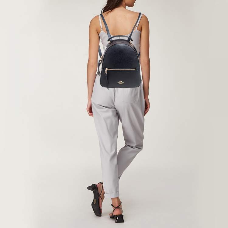 Pre Owned Coach Black/Brown Signature Coated Canvas and Leather Jordyn Backpack