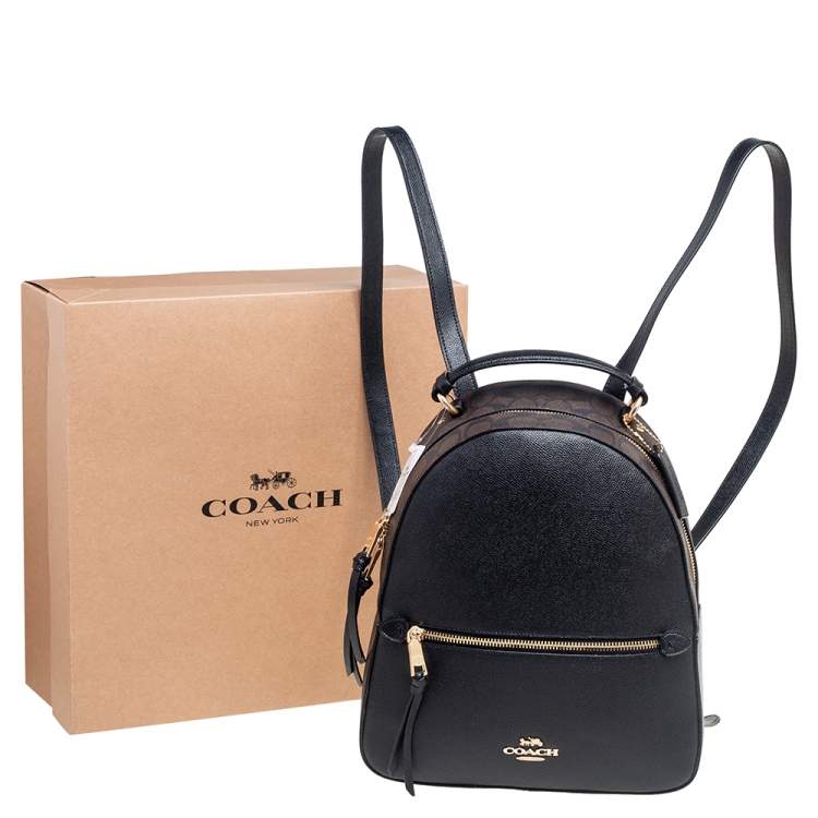 Pre Owned Coach Black/Brown Signature Coated Canvas and Leather Jordyn Backpack