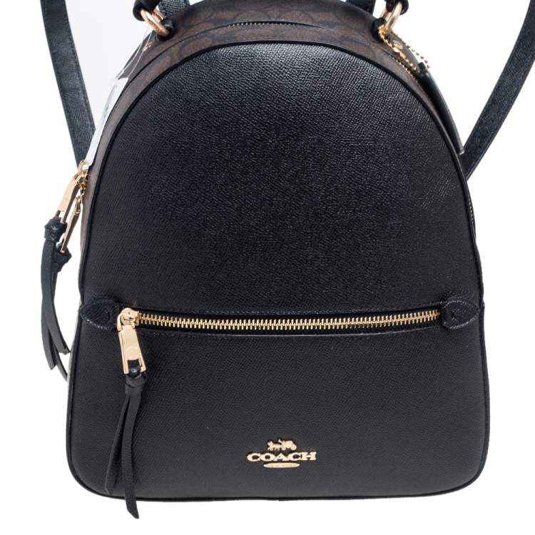 Pre Owned Coach Black/Brown Signature Coated Canvas and Leather Jordyn Backpack