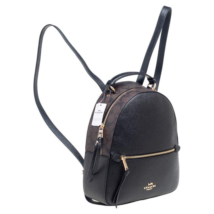 Pre Owned Coach Black/Brown Signature Coated Canvas and Leather Jordyn Backpack