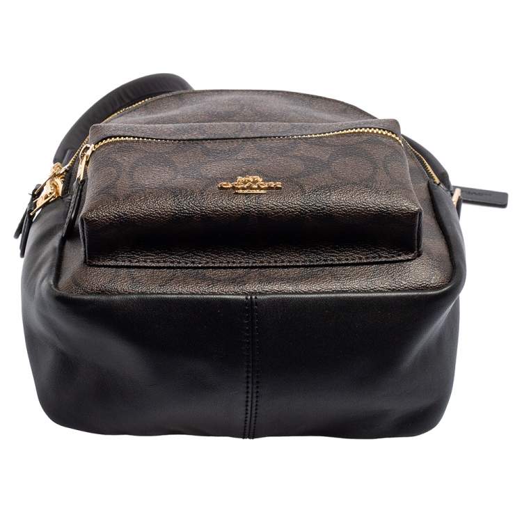 Pre Owned Coach Black/Brown Signature Coated Canvas and Leather Mini Charlie Backpack