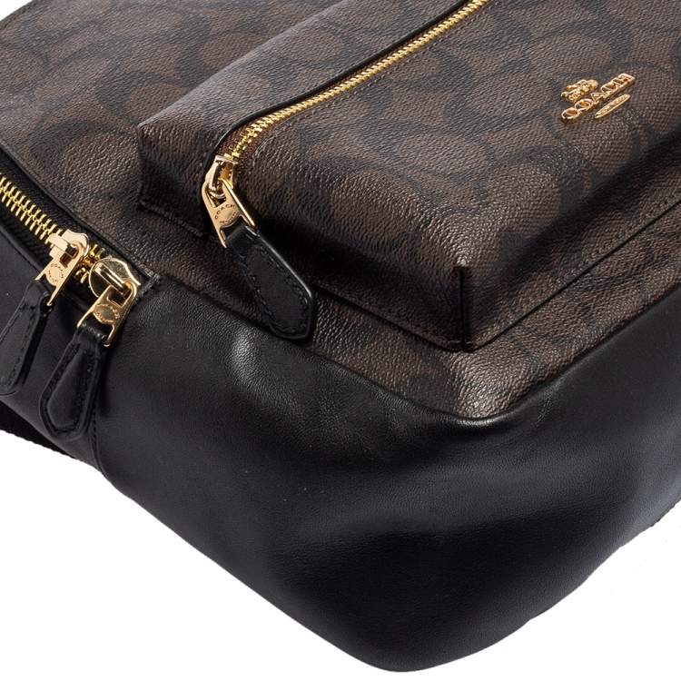 Pre Owned Coach Black/Brown Signature Coated Canvas and Leather Mini Charlie Backpack