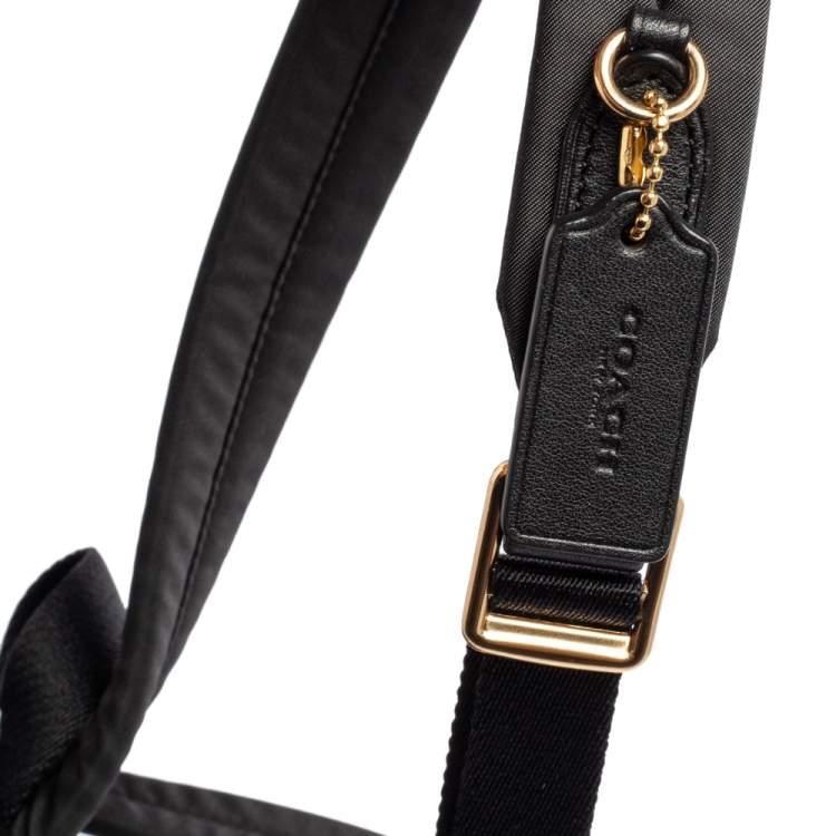 Pre Owned Coach Black/Brown Signature Coated Canvas and Leather Mini Charlie Backpack