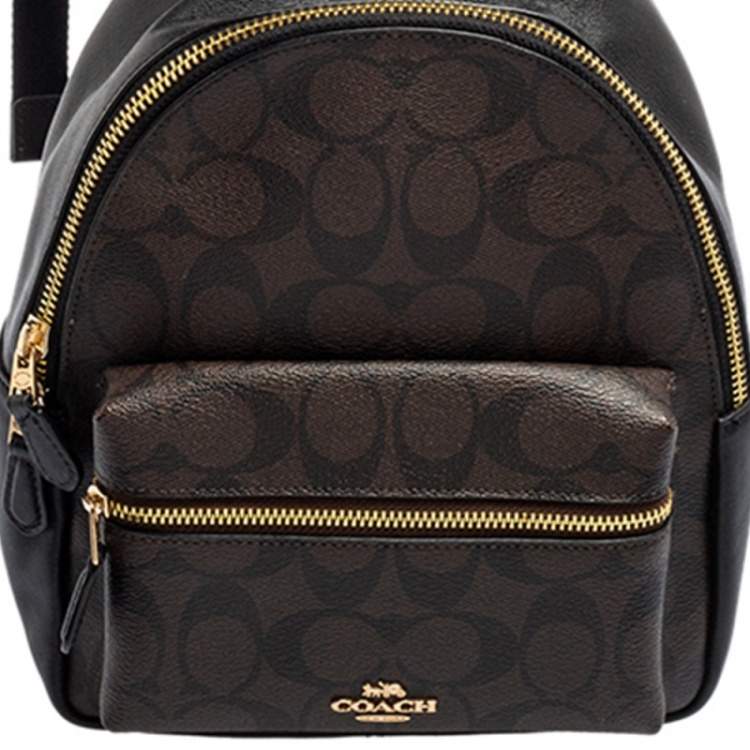 Pre Owned Coach Black/Brown Signature Coated Canvas and Leather Mini Charlie Backpack