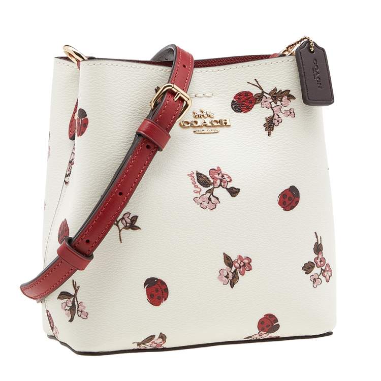 Pre Owned Coach White Printed Coated Canvas and Leather Mini Town Crossbody Bucket Bag