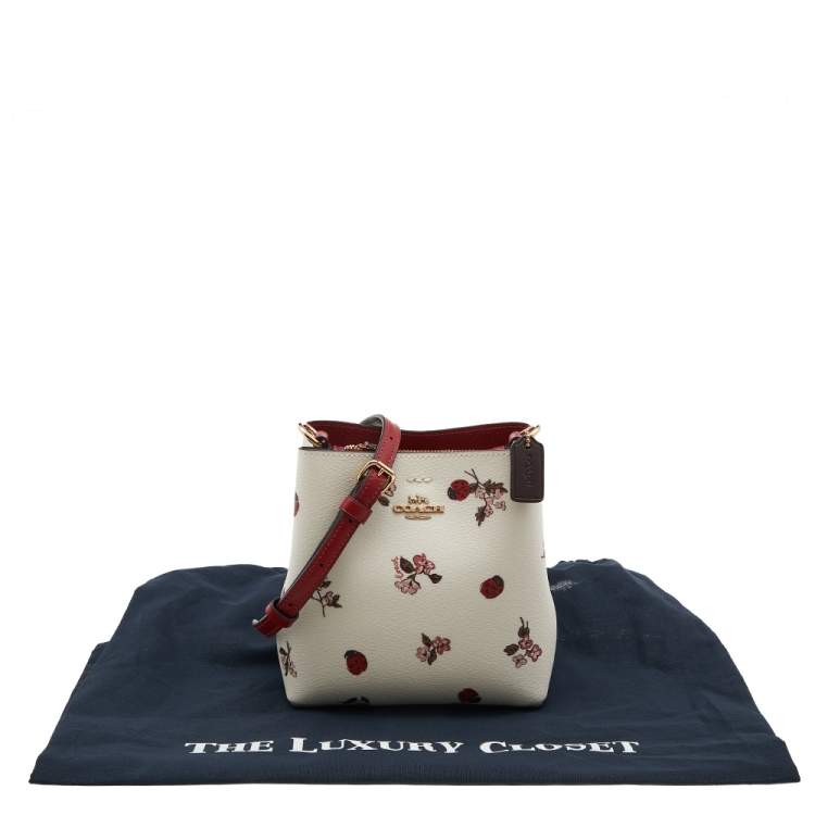 Pre Owned Coach White Printed Coated Canvas and Leather Mini Town Crossbody Bucket Bag