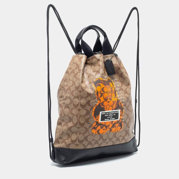 Pre Owned Coach Brown/Black Leather And Signature Coated Canvas City Backpack