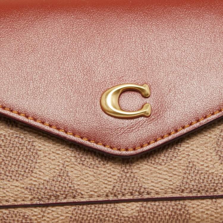 Pre Owned Coach Beige/Tan Signature Coated Canvas and Leather Continental Wallet