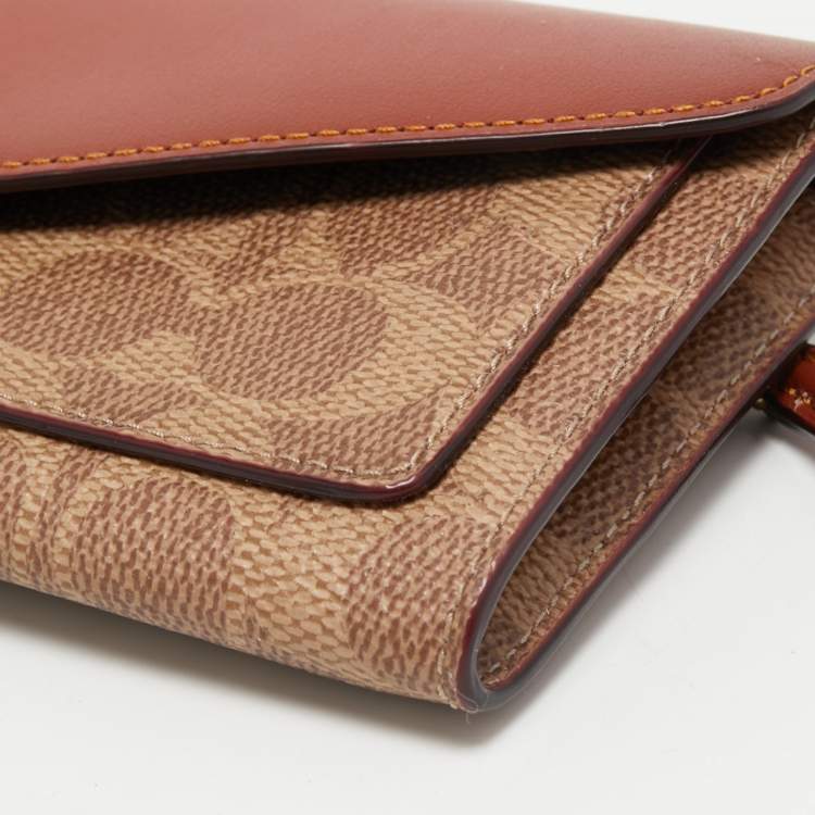 Pre Owned Coach Beige/Tan Signature Coated Canvas and Leather Continental Wallet