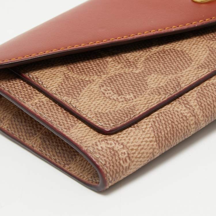 Pre Owned Coach Beige/Tan Signature Coated Canvas and Leather Continental Wallet