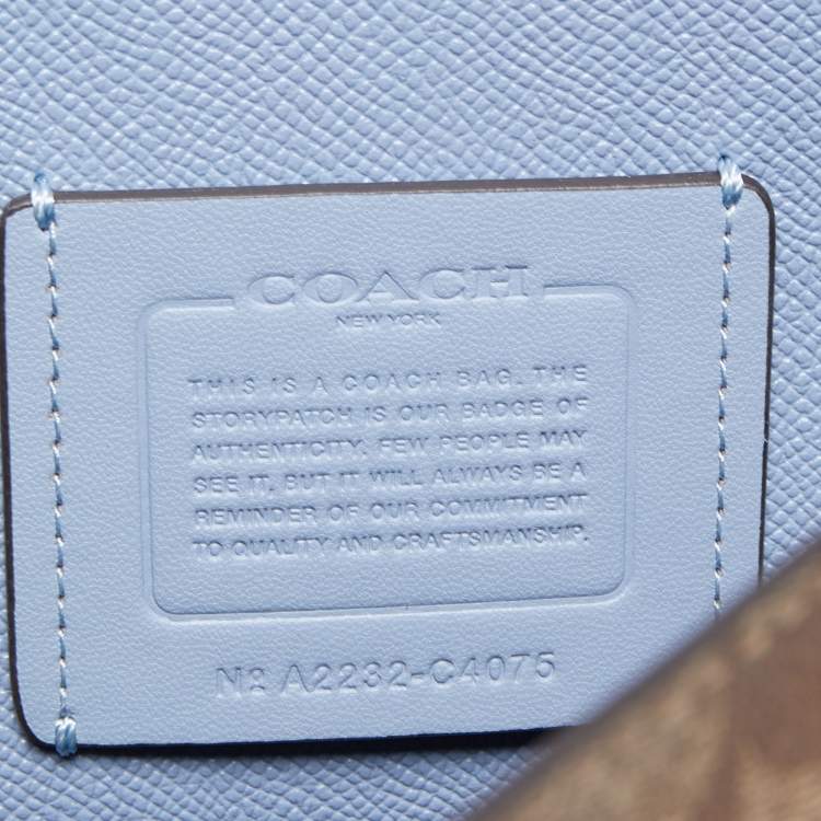 Pre Owned Coach Light Blue/Beige Signature Coated Canvas and Leather Tatum Caryall Tote