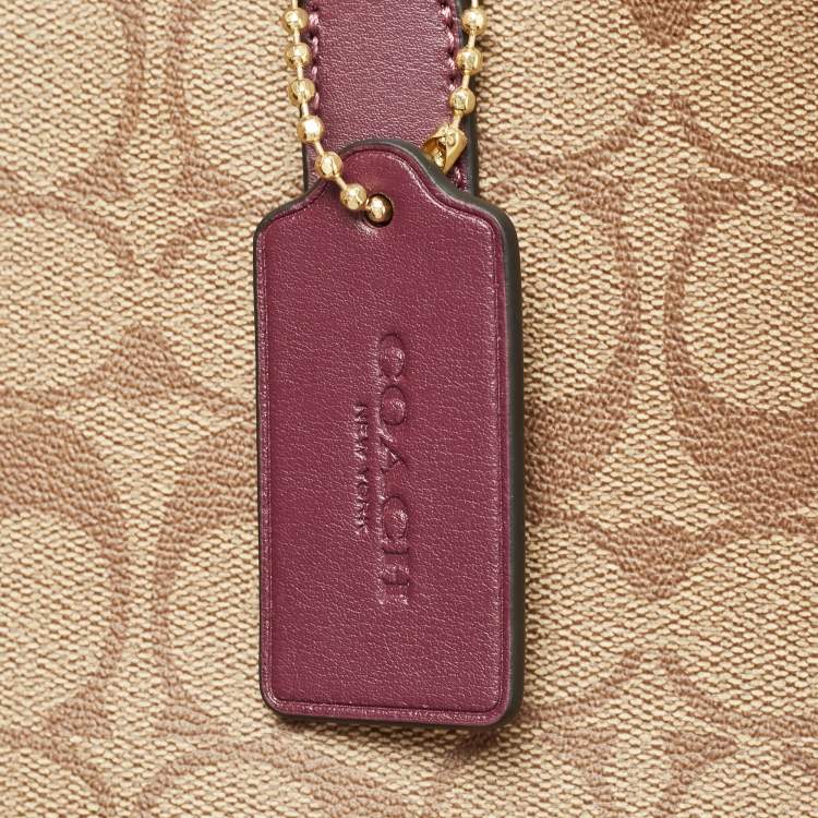 مملوكة مسبقًا Coach Beige/Purple Signature Coated Canvas and Leather City Tote