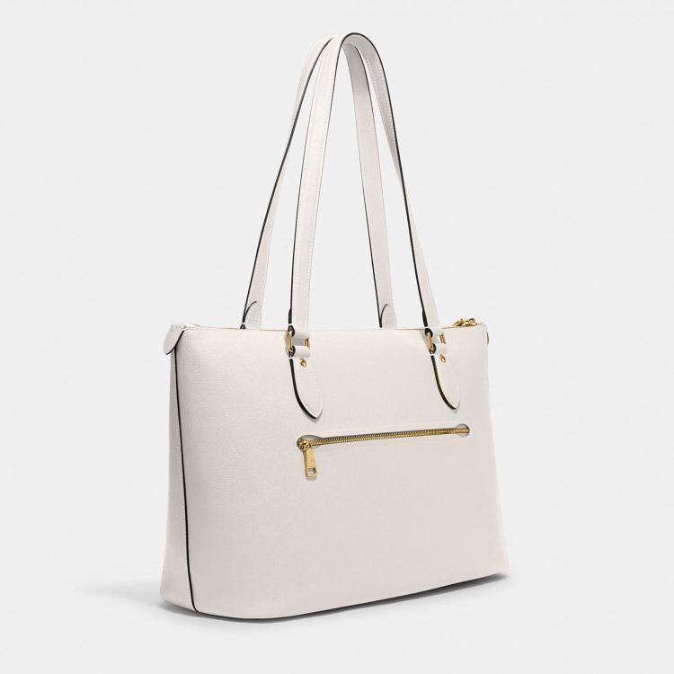 Coach Ivory Laser Cut Leather Maggie Shoulder Bag at 1stDibs | ivory coach  purse, coach ivory bag, coach ivory purse
