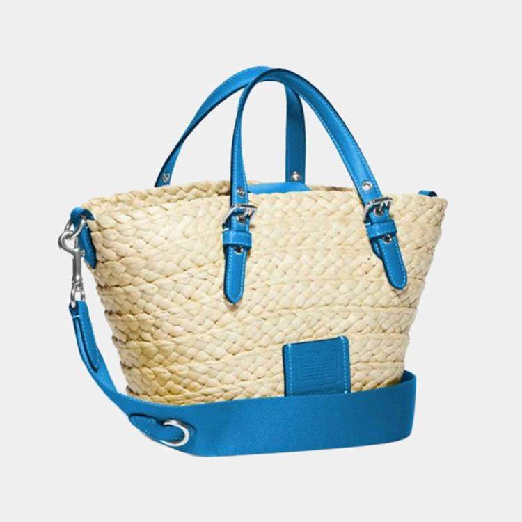 I'm so obsessed with the new spring collection @coach🌻🌾 the straw is... |  TikTok
