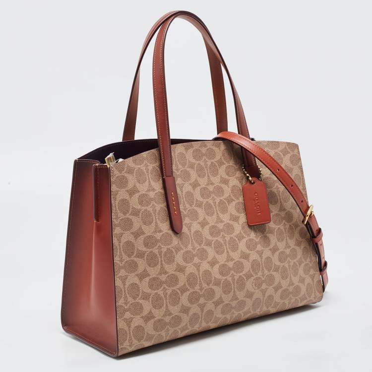 Pre Owned Coach Beige/Brown Signature Coated Canvas and Leather City Zip Tote