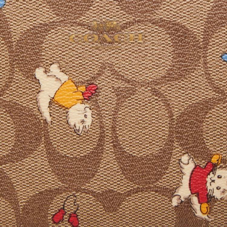 Pre Owned Coach Beige Signature Coated Canvas Cat Mittens Zip Wristlet Pouch