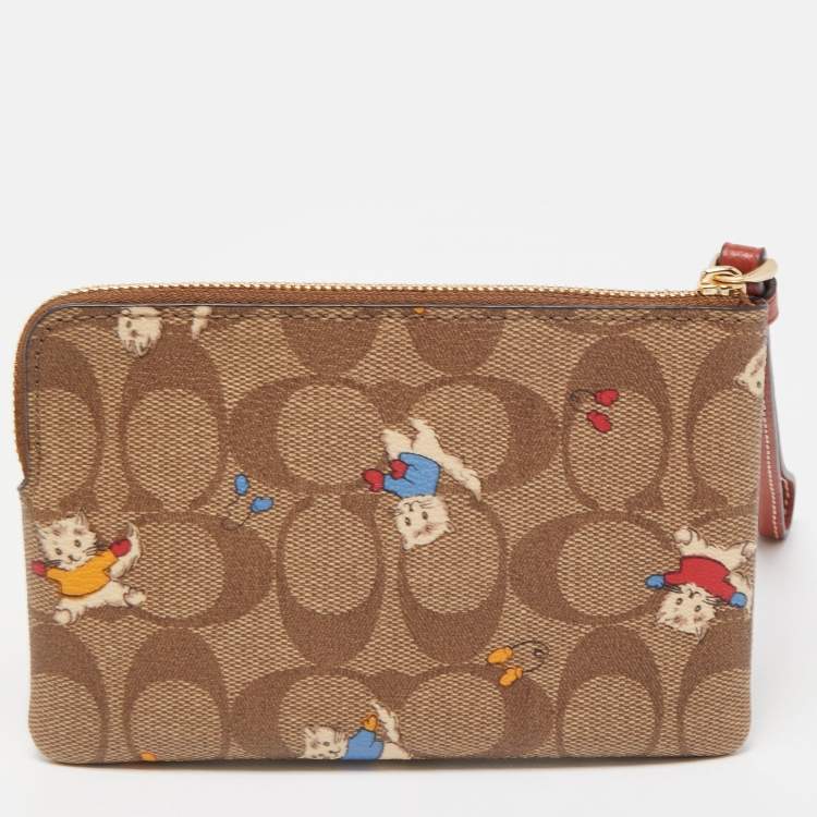 Pre Owned Coach Beige Signature Coated Canvas Cat Mittens Zip Wristlet Pouch