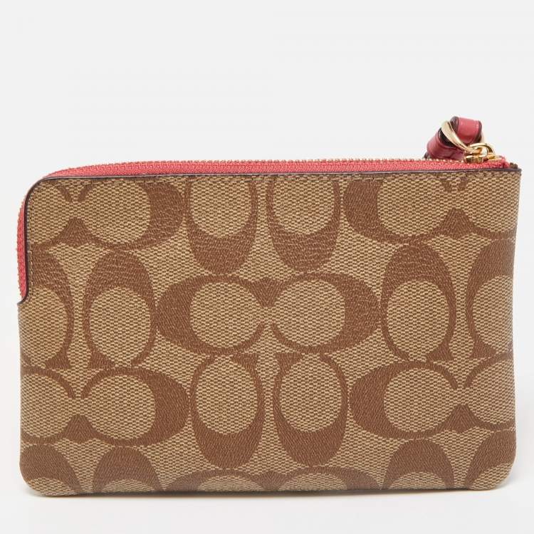 Pre Owned Coach Beige/Old Rose Signature Coated Canvas and Leather Disco Patch Wristlet Pouch