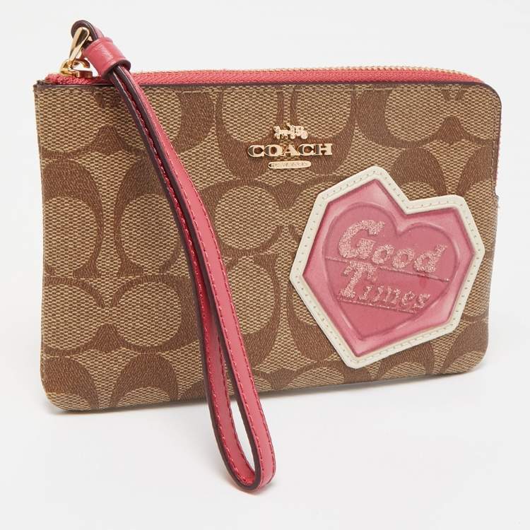Pre Owned Coach Beige/Old Rose Signature Coated Canvas and Leather Disco Patch Wristlet Pouch
