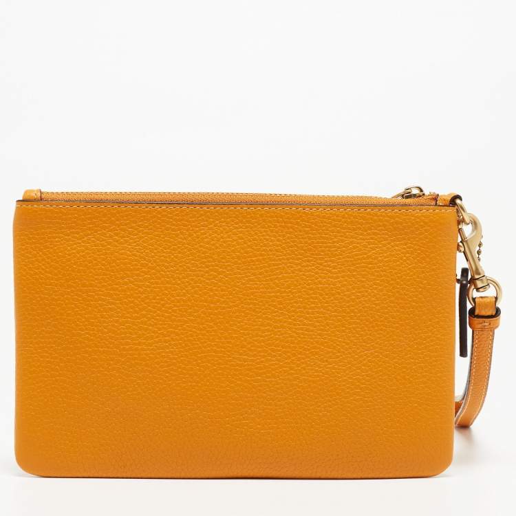Pre Owned Coach Orange Leather Wristlet Zip Pouch