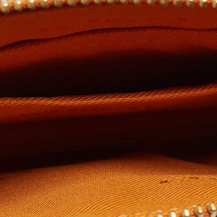 Pre Owned Coach Orange Leather Wristlet Zip Pouch