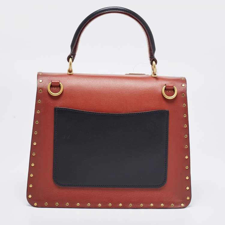 Pre Owned Coach Beige/Brown Signature Coated Canvas and Leather Parker Top Handle Bag