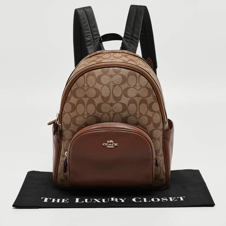 Pre Owned Coach Brown/Beige Signature Coated Canvas and Leather Court Backpack